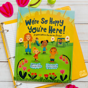Cover of new student book: We're So Happy You're Here, A Warm Welcome for our New Student